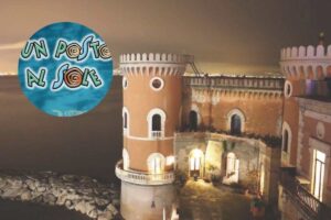un castello e il logo di un posto al sole