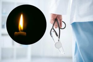 medico con lo stetoscopio e candela